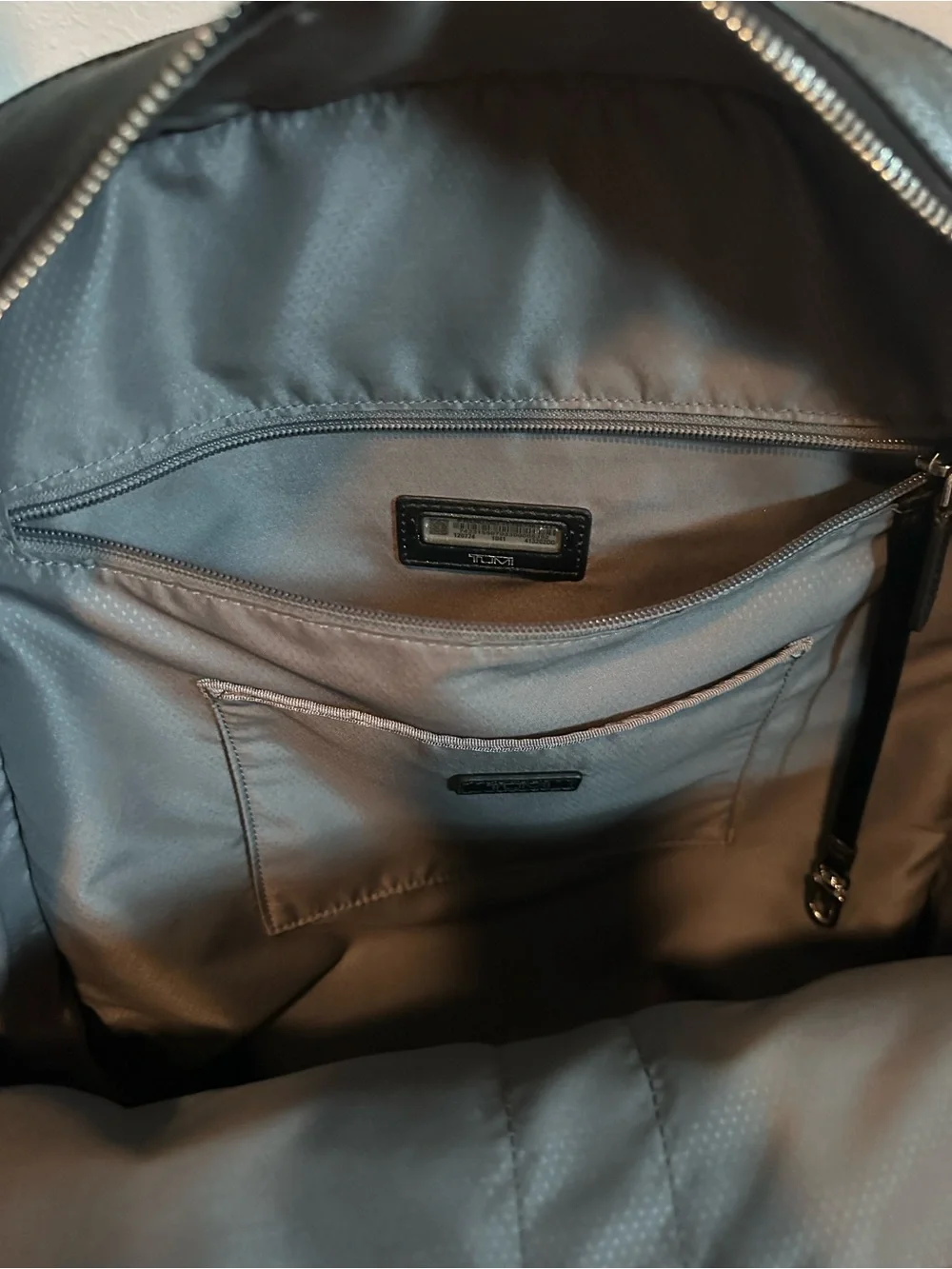 Tumi Black Leather Laptop Backpack with Silver Hardware